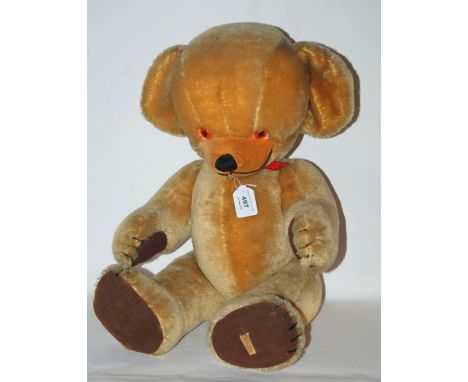 A large Merrythought Cheeky Teddy bear, 62cm long Condition Report: Available upon request