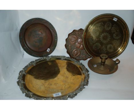 A collection of copper and brass including salver, 40cm, chamber candlestick etc Condition Report: Available upon request