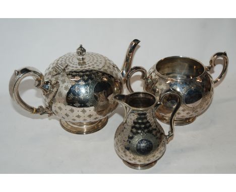 A three piece silver plated tea service Condition Report: Available upon request