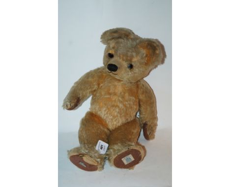 A large Chad Valley Teddy bear, 50cm long Condition Report: Available upon request