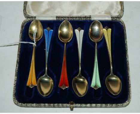 A cased set of six silver gilt and enamel coffee spoons by David Andersen Condition Report: Available upon request