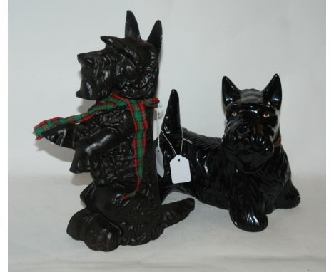 A Scottie dog door stop, Scottie dog ceramic and metal reclining figure (3) Condition Report: Available upon request