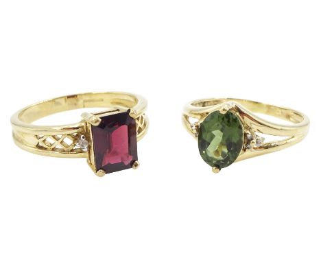 Gold three stone green garnet and diamond ring and a gold three stone garnet and white topaz ring, both 9ctCondition Report:A