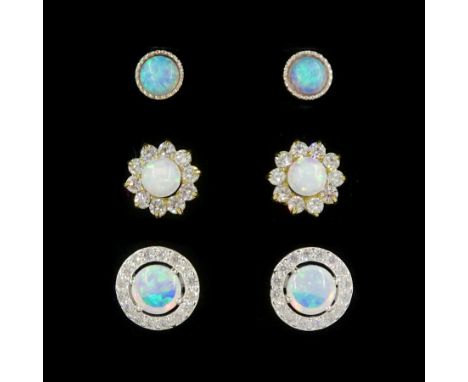 Pair of 9ct gold opal and cubic zirconia stud earrings and two other pairs of silver opal stud earringsCondition Report:9ct a