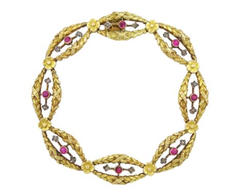 Late 19th / early 20th century French 18ct gold ruby and diamond fancy link bracelet, each laurel wreath link with a round cu