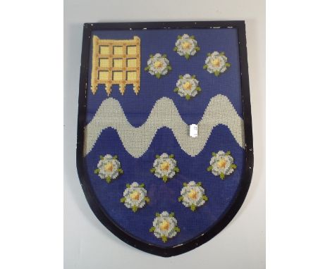 A Framed Tapestry Heraldic Shield, 45cm High 