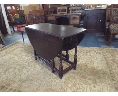 A Period Oak Oval Top Drop Leaf Gate Legged Table with Drawers Either End, 101cm Long