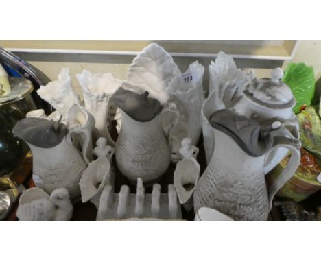 A Tray Containing Ceramic Cream Ware Items to Include Toast Rack, Set of Three Graduated Pewter Topped Fern Leaf Jugs, Coalpo