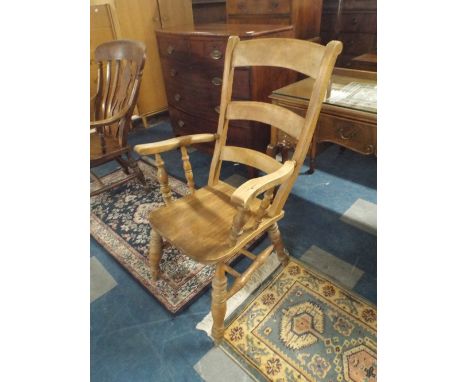 An Elm Seated Ladder Back Kitchen Arm Chair