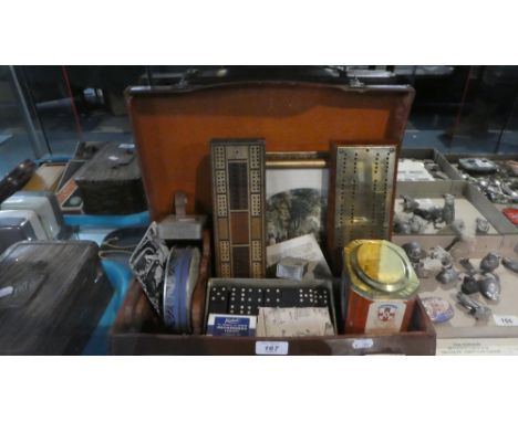 A Vintage Suitcase Containing Dominoes, Cribbage Boards, Playing Cards, Prints Etc