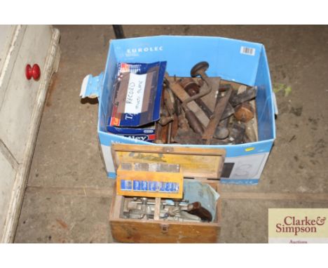 A box containing various hand tools