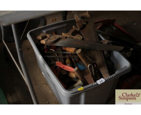 A box of various hand tools
