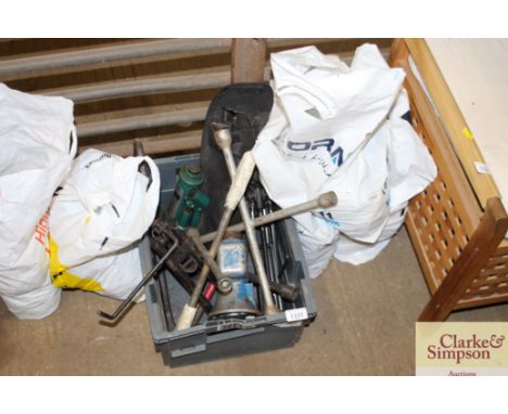 A box of various hand tools 