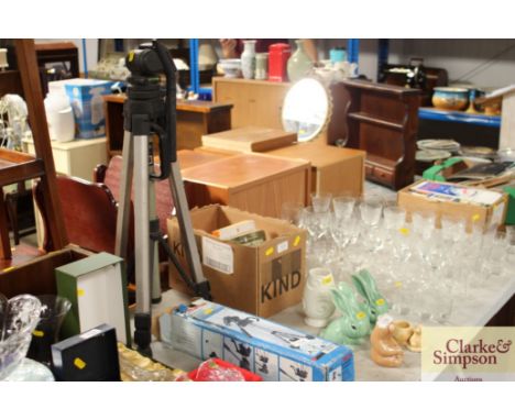 A camera tripod and one other in original box