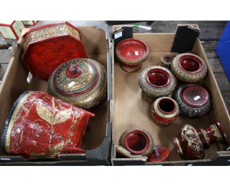 A collection of decorative ruby red Chinese papermache boxes, vases, jars etc (2 trays)