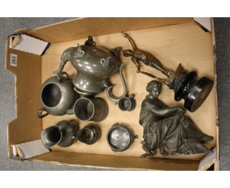 A collection of pewter and Spelter items to include art deco clock ornaments, decorative tea ware, goblets, etc
