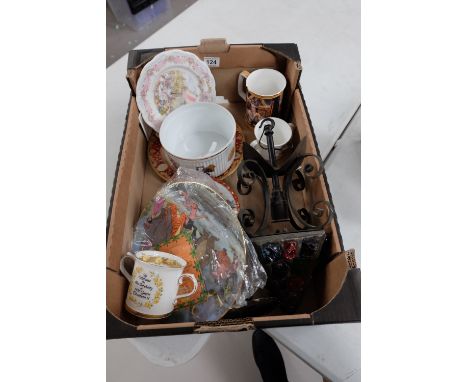 A mixed collection of items including commemorative items, Japanese 20th century plates, Collectors plates and wrought iron c