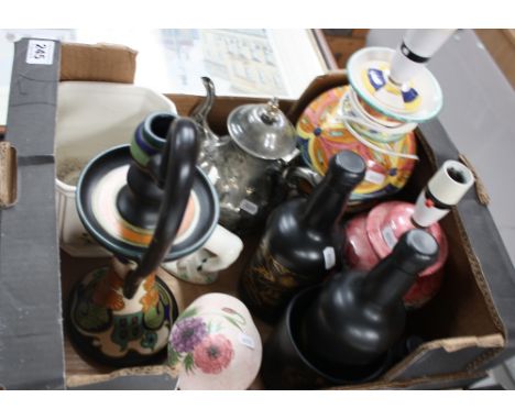 A collection of items to include Portmeirion bottles, silver plated teaset, various lamp bases etc