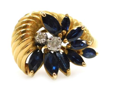 A sapphire and diamond ring, in a floral cornucopia design, in yellow metal, stamped 14k, size K, 5.6g.