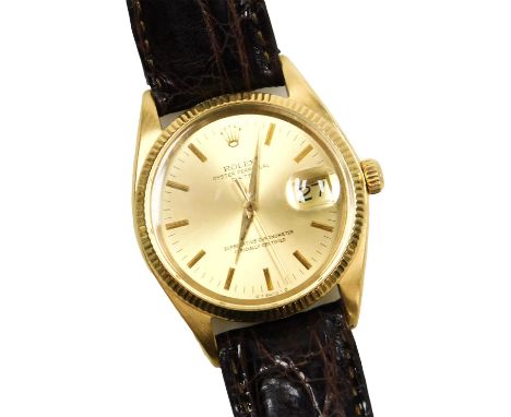 A Rolex 18ct gold cased Oyster Perpetual date gentleman's wristwatch, circular dial with gold batons, centre seconds, marked 