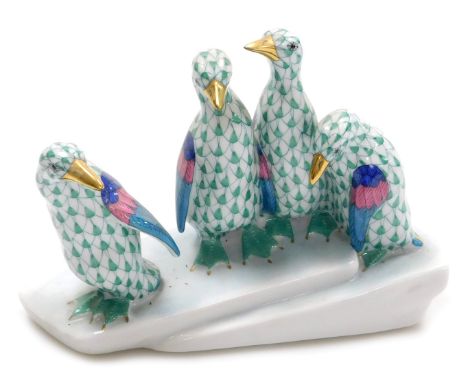 A Herend porcelain figure group of penguins, green scale ground, raised on an iceflow base, printed, impressed and painted ma