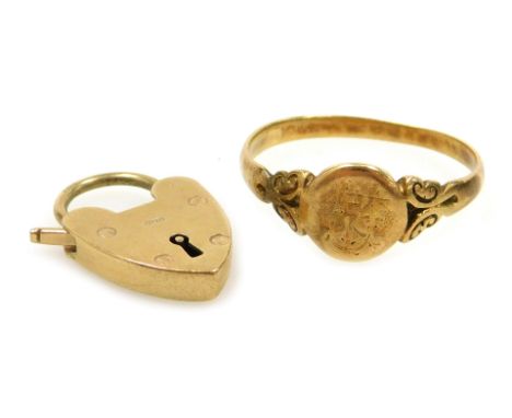 A 9ct gold heart shaped padlock clasp, 2.1g, and a Victorian signet ring, yellow metal, monogram engraved, internally engrave