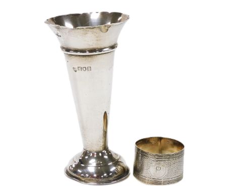 An Edward VII silver vase, of trumpet form, London 1905, and a silver napkin ring, with engine turned decoration, Birmingham 