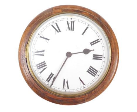 An early 20thC oak case wall clock, circular enamel dial bearing Roman numerals, clockwork movement, 38cm wide.