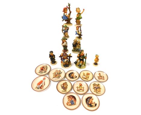 A group of Hummel figures, including Apple Tree Girl, Mountaineer and Chimney Sweep, together with eleven Hummel plates. (qty