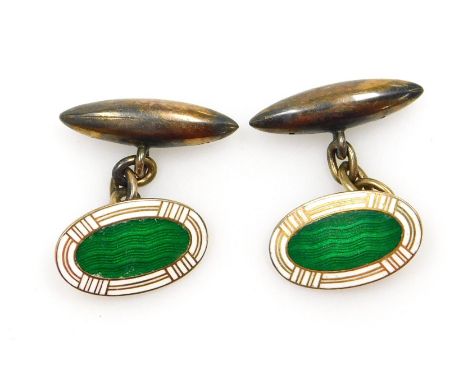A pair of enamel oval torpedo and chainlink cufflinks, marked 9ct, 5.6g.