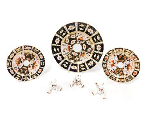 A Royal Crown Derby Imari porcelain plate, pattern number 2451, second, together with a pair of tea plates and three figures 