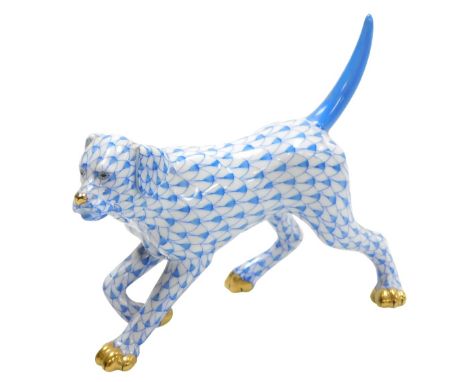 A Herend porcelain figure of a labrador, blue scale ground, printed and painted marks, 14.5cm wide.