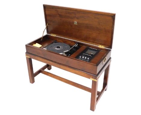 A mahogany cased Dynatron radiogram, with a Dynotron radio and stereophonic tuner amplifier SRX 29C, and a Garrard SP25 MKIV 