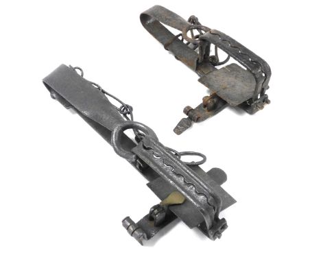 Two 19thC gin traps.