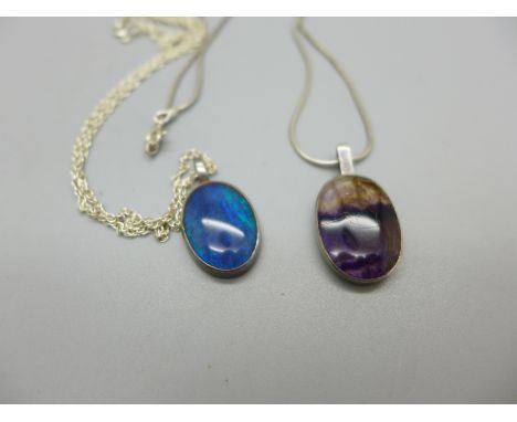 A hallmarked silver and Blue John pendant and chain and an opal set pendant and silver chain 