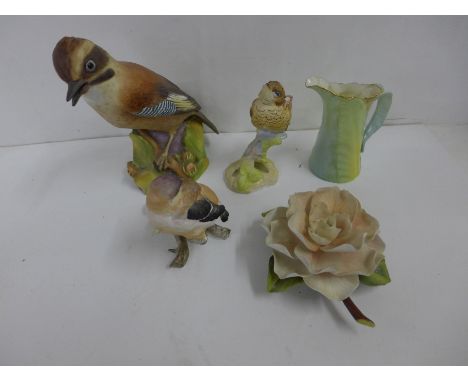 Five items of Royal Worcester; Fledgling Robin, Fledgling bullfinch, Jay, Camellia and a jug