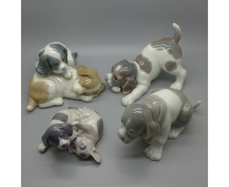 Four models of dogs, Nao, two Lladro and Royal Copenhagen 