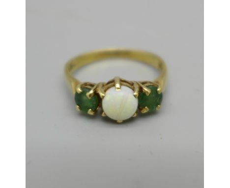 A 9ct gold, opal and emerald ring, 2g, M 