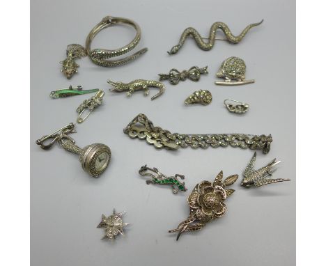 A silver and marcasite pendant watch by Bucherer, a hallmarked silver and marcasite snake bangle with spring hinge, a silver 