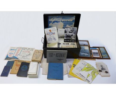 A RCAF pilot's flying log book with a metal trunk containing an extensive collection of related ephemera, photographs and mem