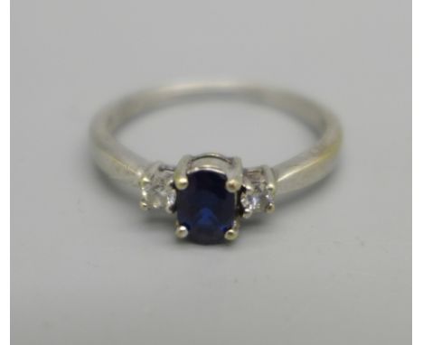 A white metal, sapphire and diamond ring, 2.1g, N 