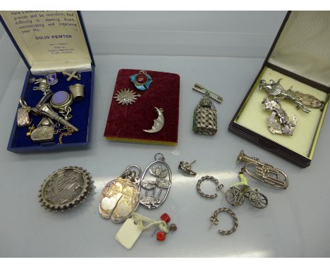 A Victorian silver faith, hope and charity brooch, Chester 1895, a white metal harp and shamrock brooch, a sterling ballet br