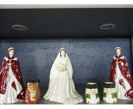 Three Royal Worcester figures of the young Queen Elizabeth II, together with three small character jugs