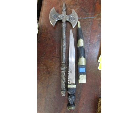 A 20th century Scottish Skidu Kirk with plaited, carved and ebonized wooden handle, set with a foil backed glass stone, the b