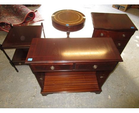 A reproduction mahogany serpentine fronted chest of four drawers on bracket feet, a matching lamp table with a base drawer, a