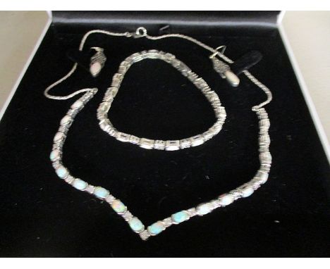 A 925 silver, opal coloured and white stone necklace, bracelet and earring set, boxed, possibly Scottish