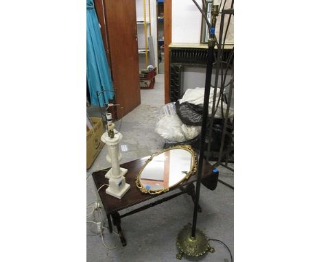 A brass standard lamp, two gilt mirrors and two white marble table lamps