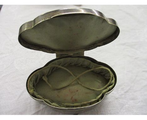 A silver trinket box, footed and lined