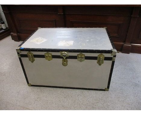A large metal clad coloured trunk