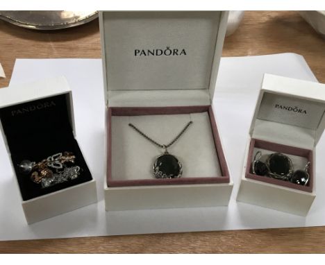 A silver Pandora Jade type pendent and two boxes of Pandora and other jewellery.